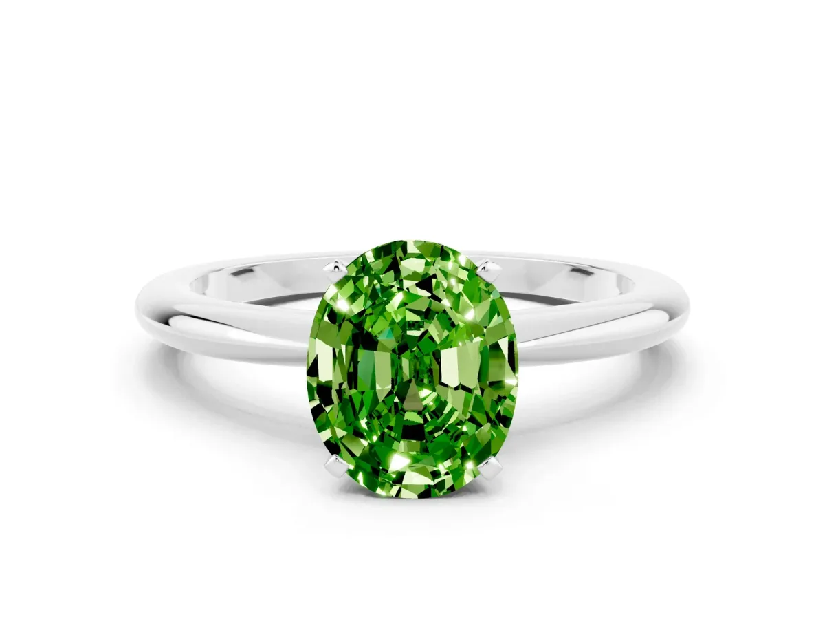 Oval Cut Peridot Solitaire Ring with Six-Prong Setting and Classic Band Platinum