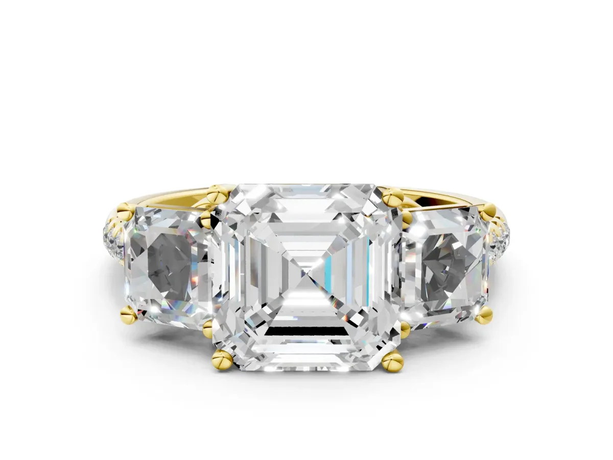 Three-Stone Asscher Cut Diamond Ring with Round Pavé Band and Prong Setting Yellow gold