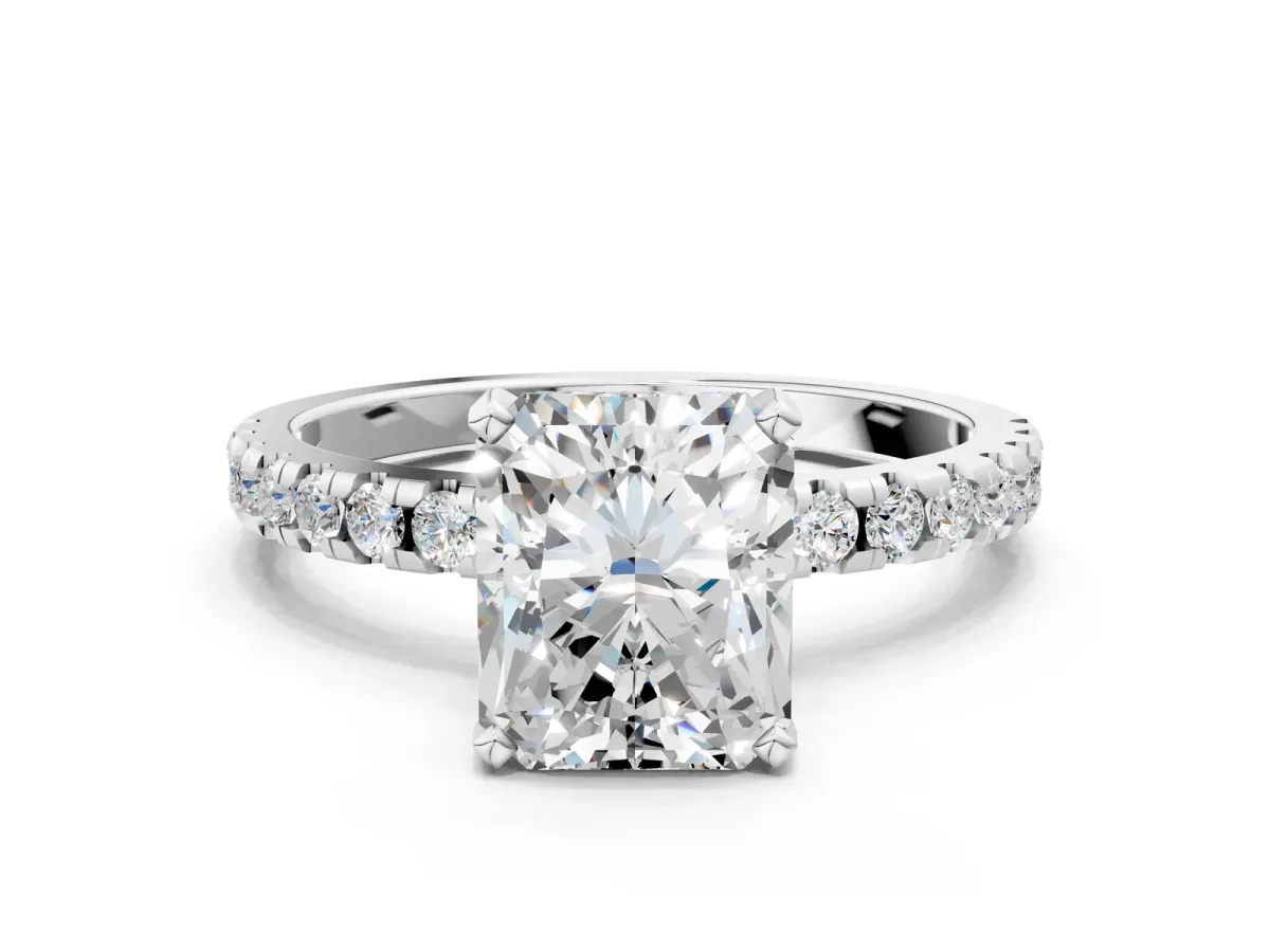 Radiant Cut Diamond Solitaire Ring with Round Moissanite Pavé Band and Four-Prong Setting White gold