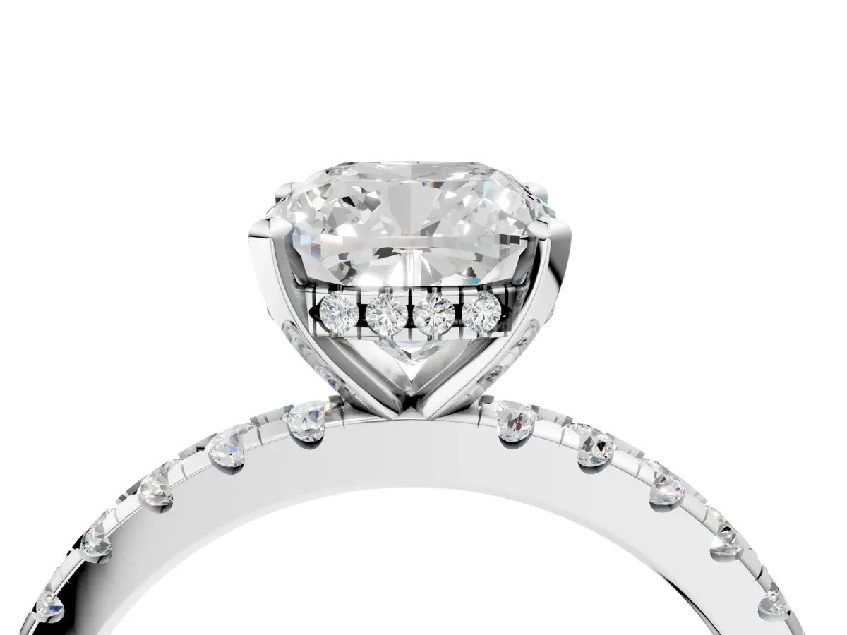 Cushion Cut Diamond Solitaire Ring with Round Moissanite Pavé Band and Four-Prong Setting White gold