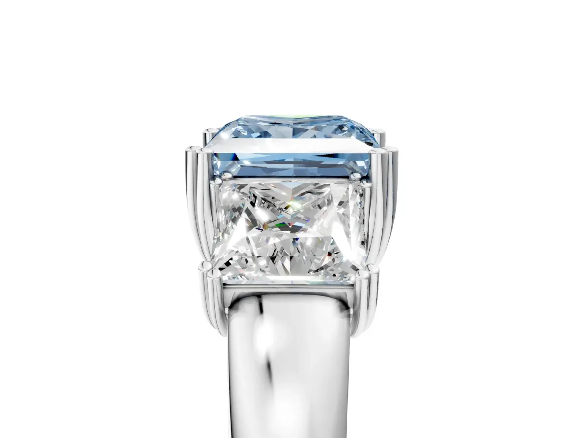 Fancy Blue Three-Stone Princess Cut Cut Diamond Ring with Channel Set Band and Four-Prong Setting Silver