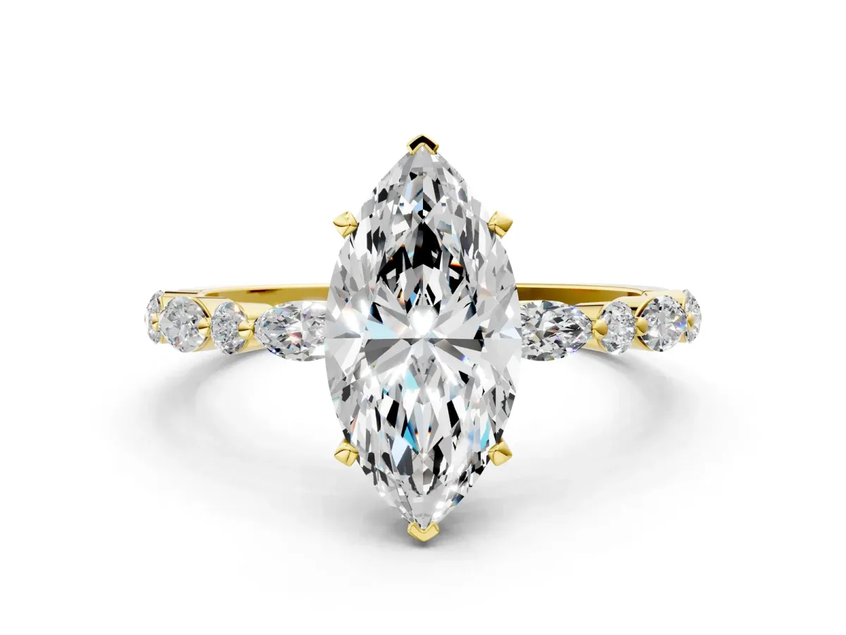 Marquise Cut Diamond Ring with Marquise and Round Side Stones and Four-Prong Setting Yellow gold