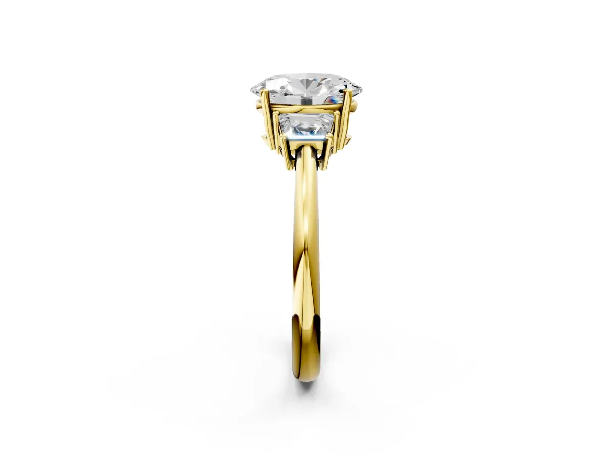 Oval Cut Diamond Three-Stone Ring with Trapezoid Side Stones and Prong Setting Yellow gold