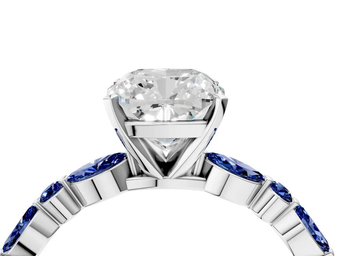 Cushion Cut Diamond Ring with Marquise and Round Blue Sapphire Side Stones and Four-Prong Setting White gold