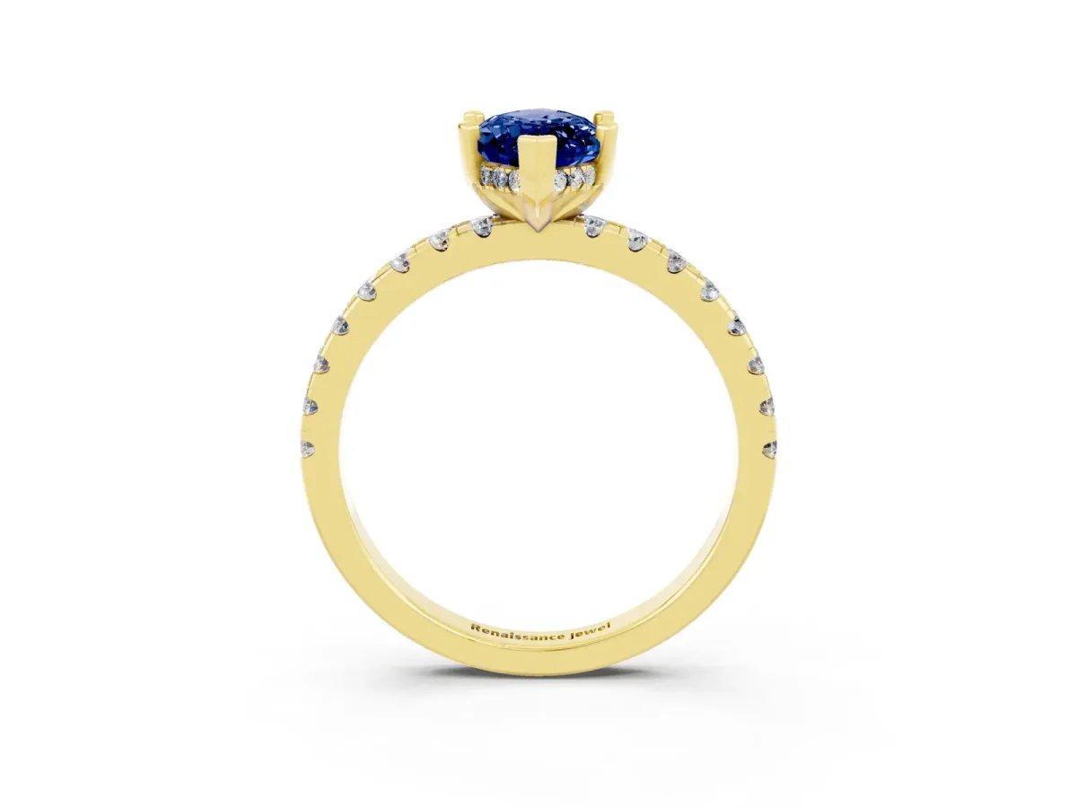 Marquise Cut Blue Sapphire Solitaire Ring with Round Pavé Band and Four-Prong Setting Yellow gold