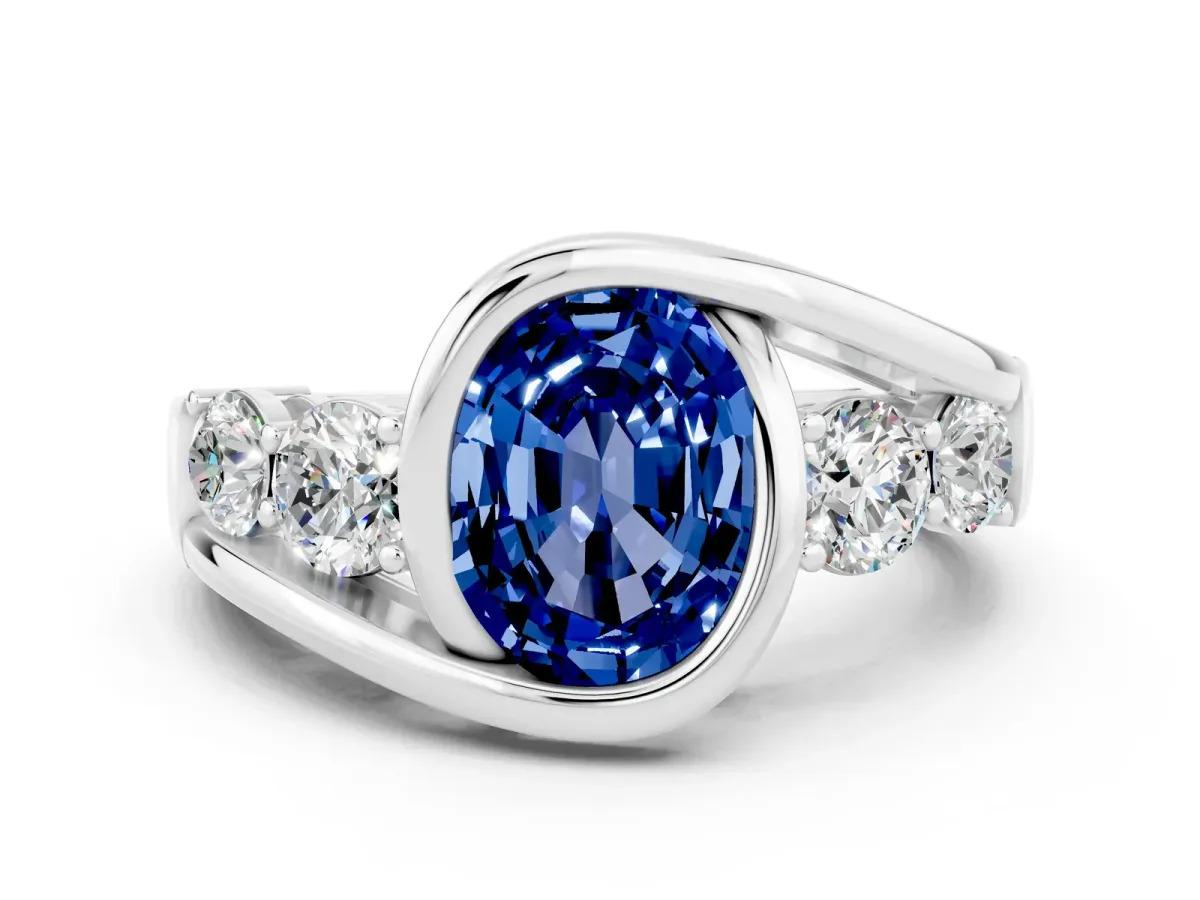 Bezel Set Oval Cut Blue Sapphire Bypass Ring with Round Accents Silver