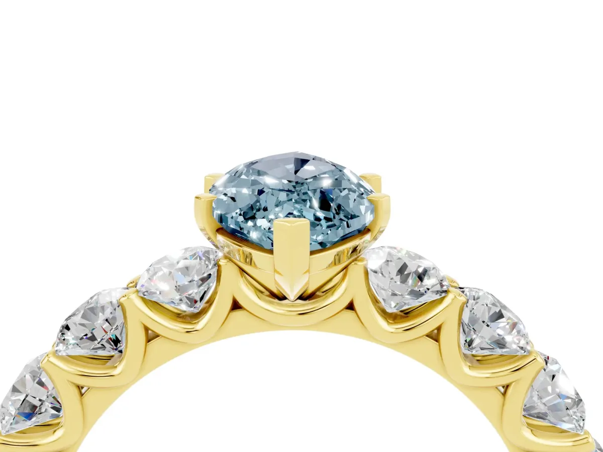 Marquise Cut Aquamarine Prong Setting with Side Stones on a Pave Band Yellow gold