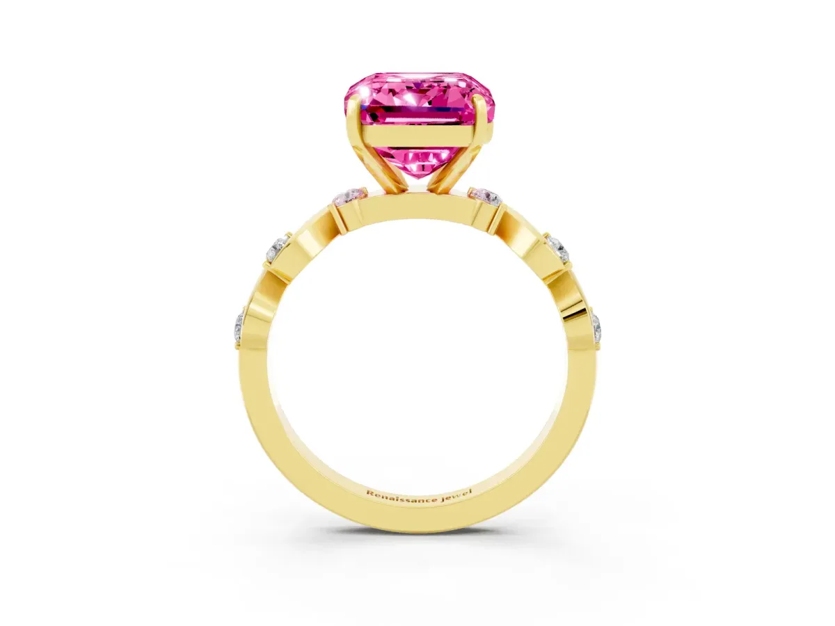 Emerald Cut Pink Sapphire Solitaire Twisted Band with Round Accents and Prong Setting Yellow gold