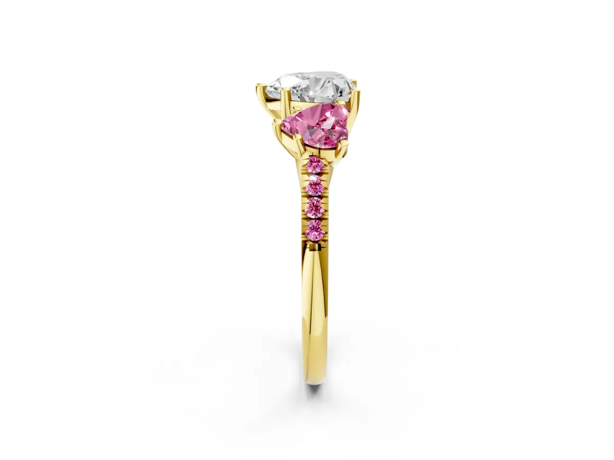 Three-Stone Heart Cut Diamond Ring with Round Pink Sapphire Pavé Band and Prong Setting Yellow gold