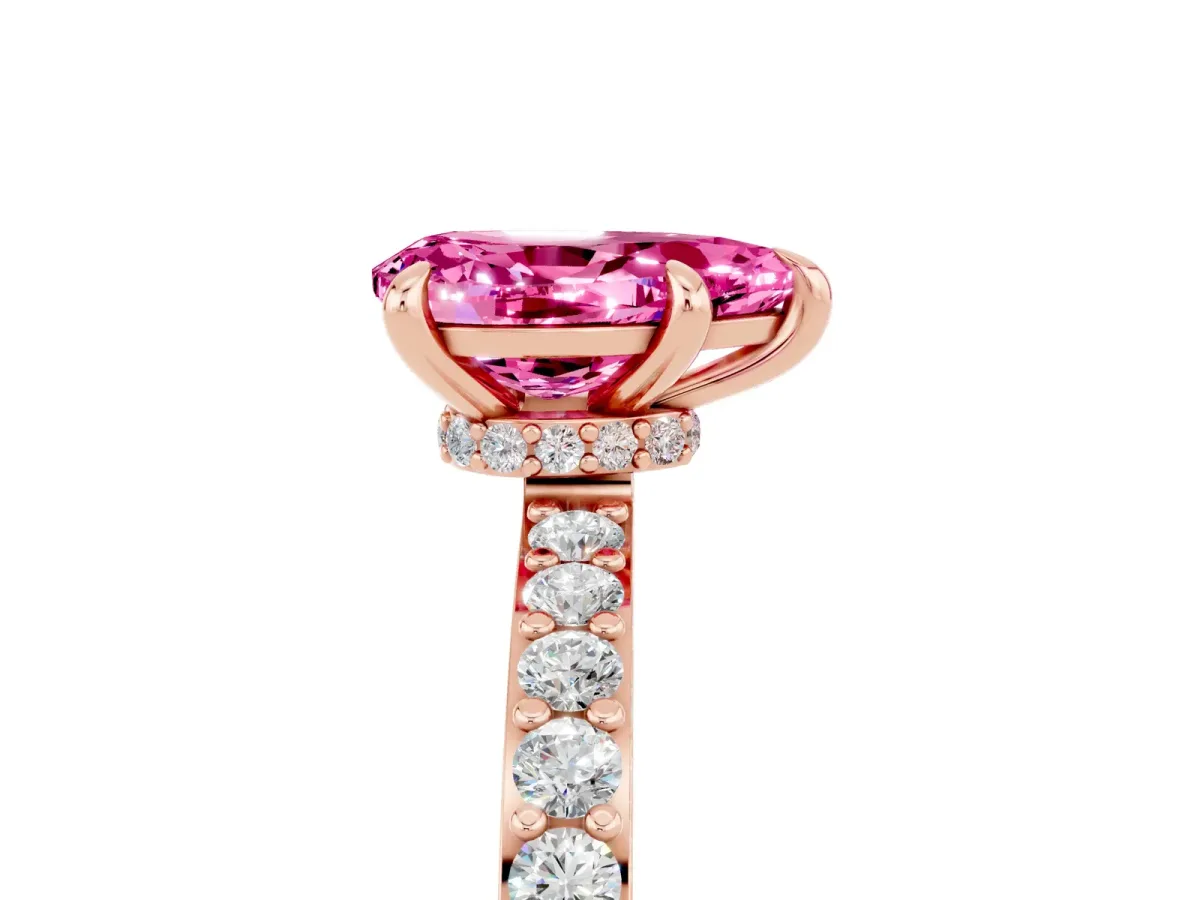 Pear Cut Pink Sapphire Solitaire Engagement Ring with Pavé Band and Four-Prong Setting Rose gold