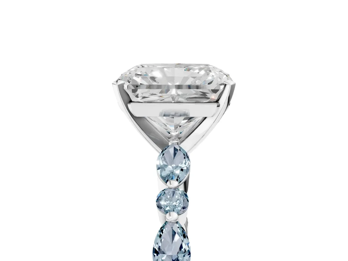 Radiant Cut Diamond Ring with Marquise and Round Aquamarine Side Stones and Four-Prong Setting Platinum