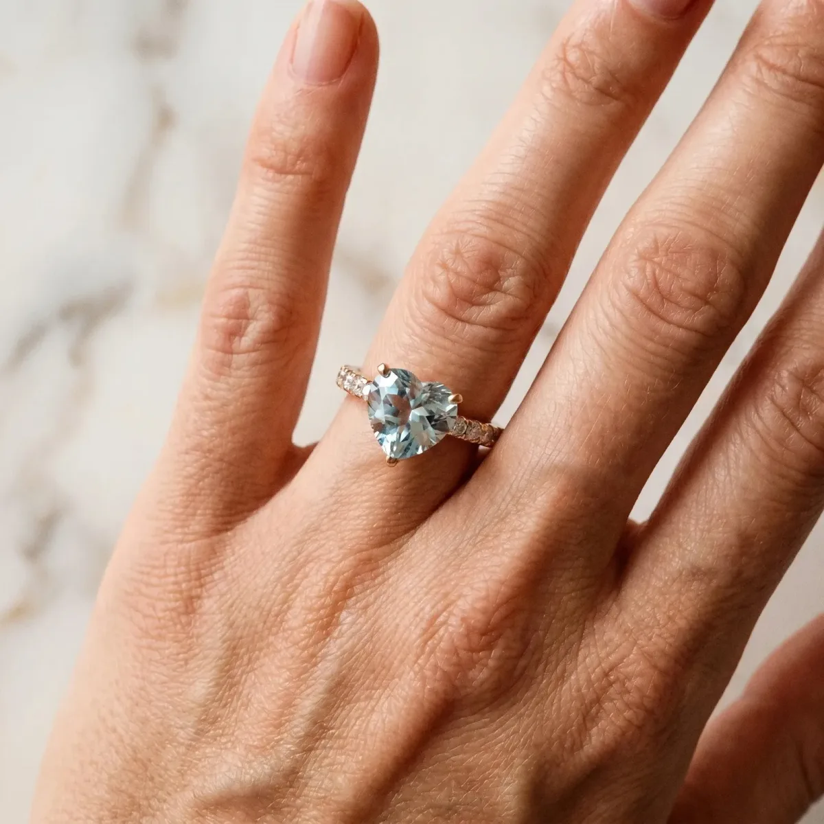 Heart Cut Aquamarine Solitaire Ring with Round Pavé Band and Four-Prong Setting Rose gold