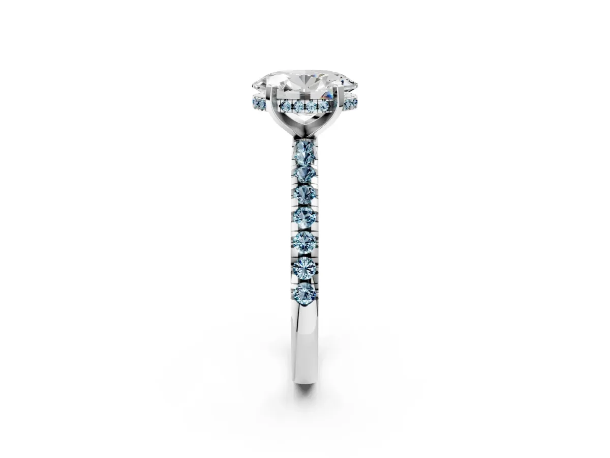 Oval Cut Diamond Solitaire Ring with Round Aquamarine Pavé Band and Four-Prong Setting White gold
