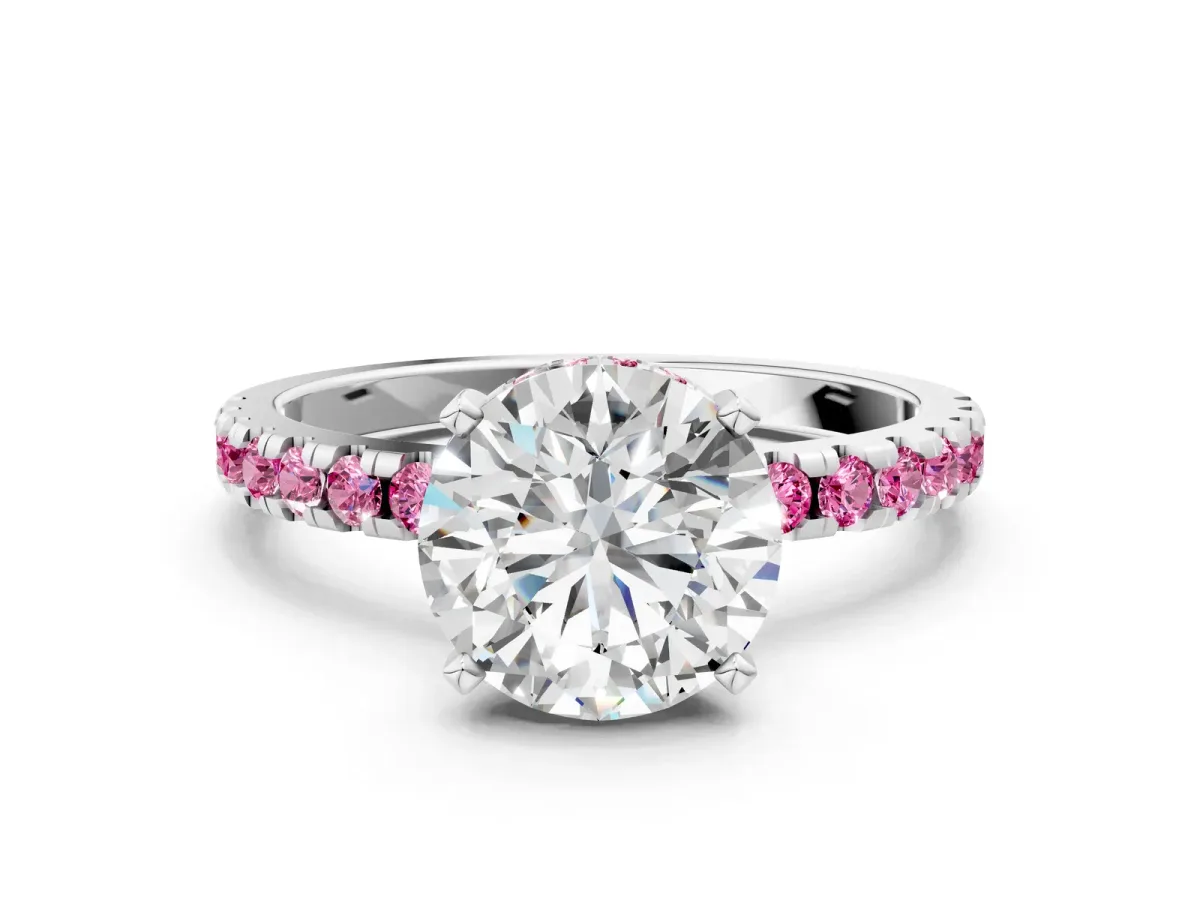 Round Cut Diamond Solitaire Ring with Round Pink Sapphire Pavé Band and Four-Prong Setting White gold