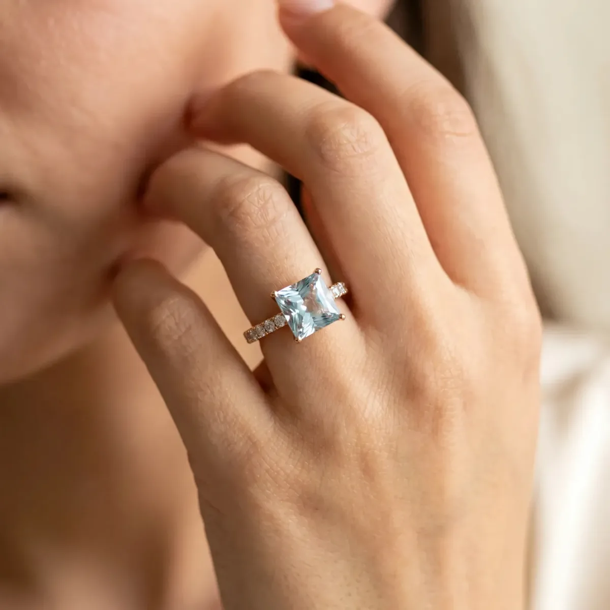 Princess Cut Aquamarine Solitaire Ring with Round Pavé Band and Four-Prong Setting Rose gold