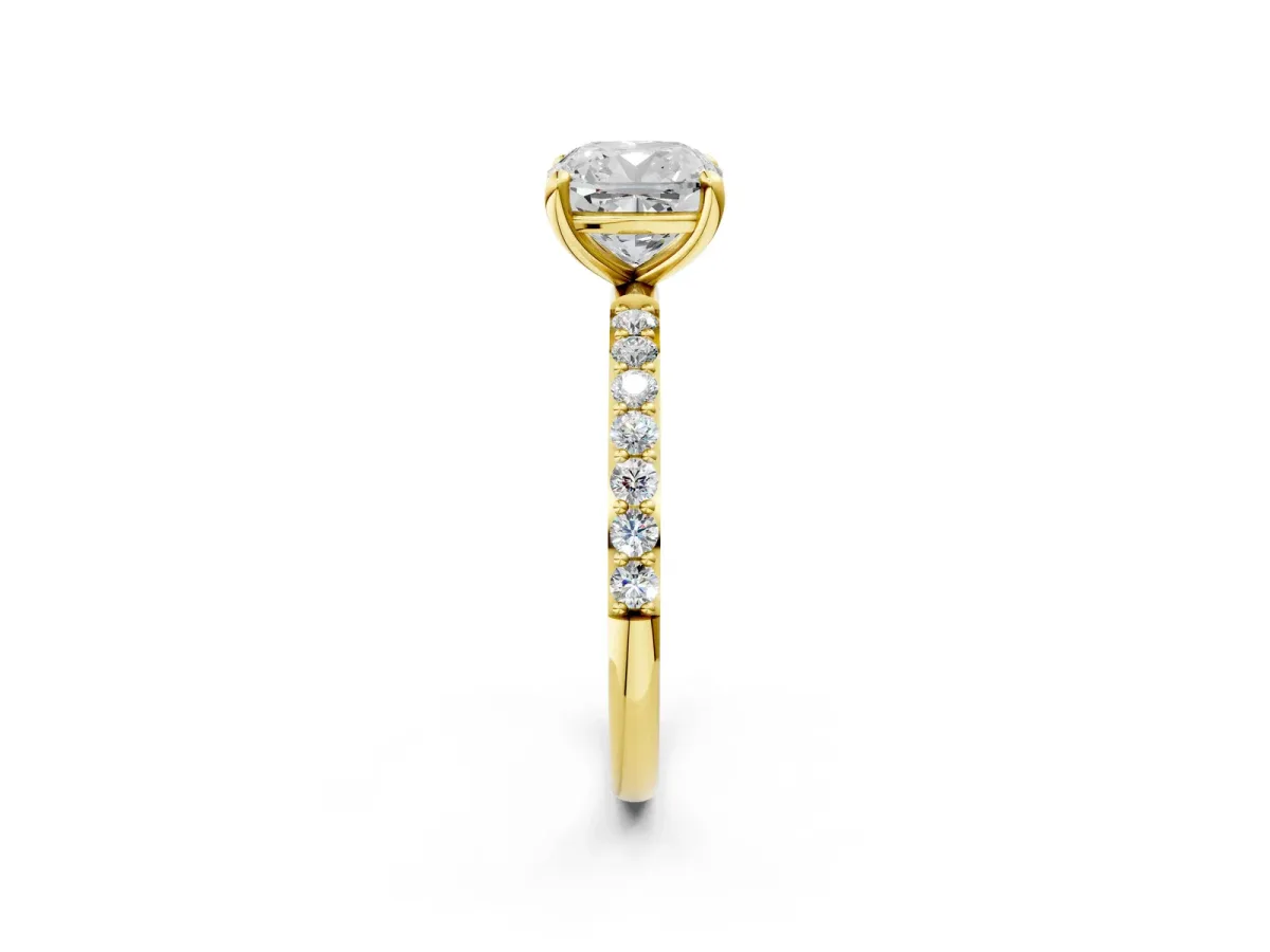Cushion Cut Diamond Solitaire Ring with Round Pavé Band and Prong Setting Yellow gold