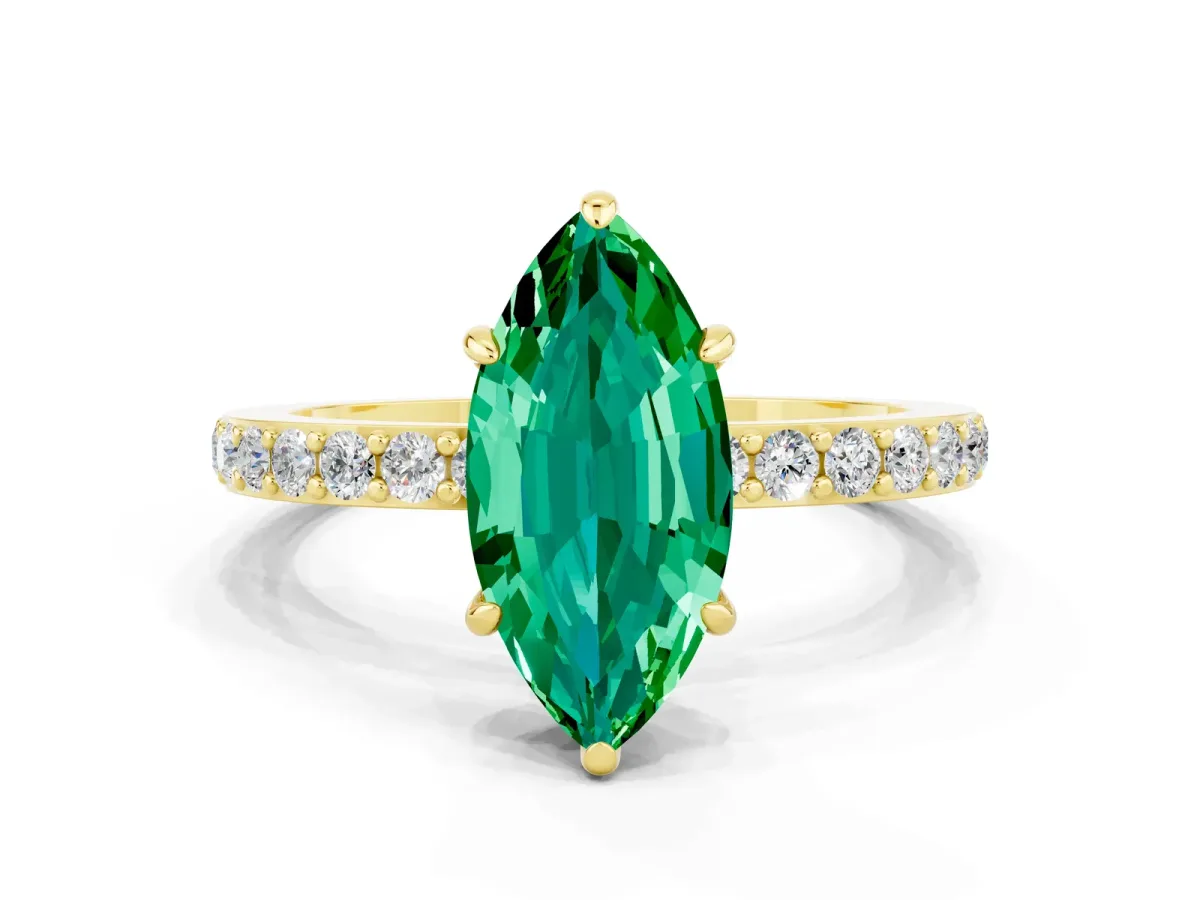 Marquise Cut Emerald Solitaire Engagement Ring with Pavé Band and Four-Prong Setting Yellow gold