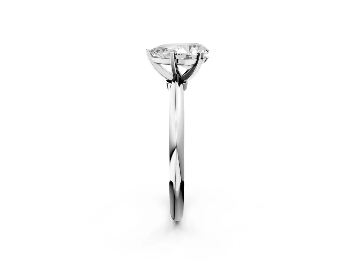 Pear Cut Diamond Solitaire Ring with Six-Prong Setting and Classic Band Platinum