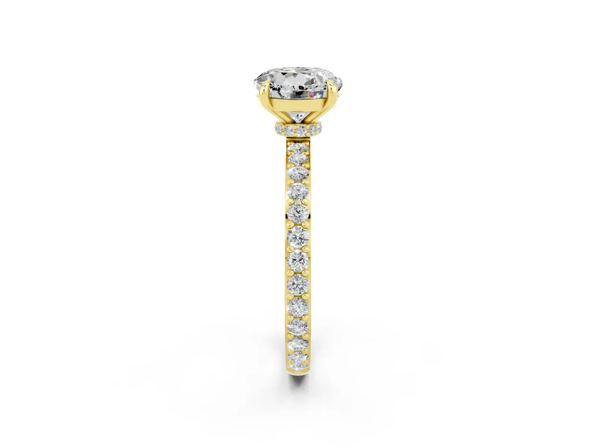 Round Cut Moissanite Solitaire Engagement Ring with Pavé Band and Four-Prong Setting Yellow gold