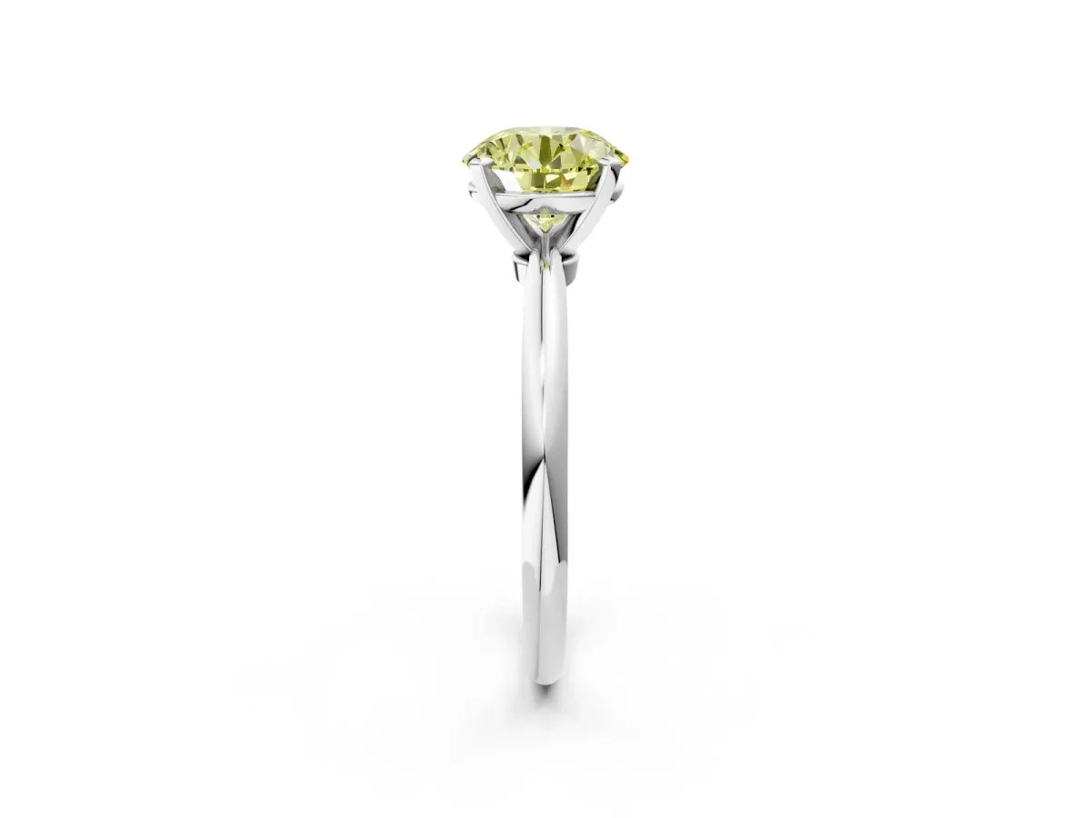 Fancy Yellow Round Cut Diamond Solitaire Ring with Six-Prong Setting and Classic Band Silver