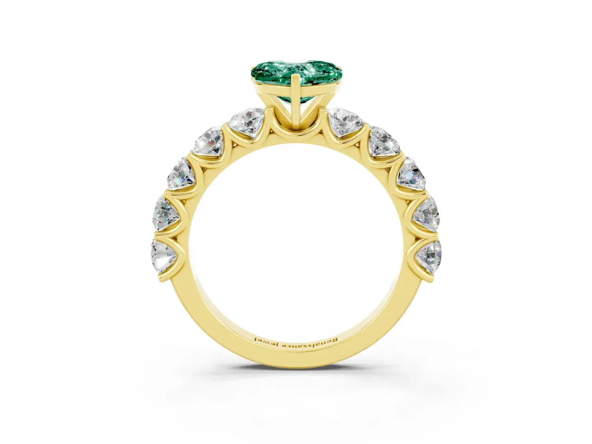 Heart Cut Green Sapphire Prong Setting with Side Stones on a Pave Band Yellow gold