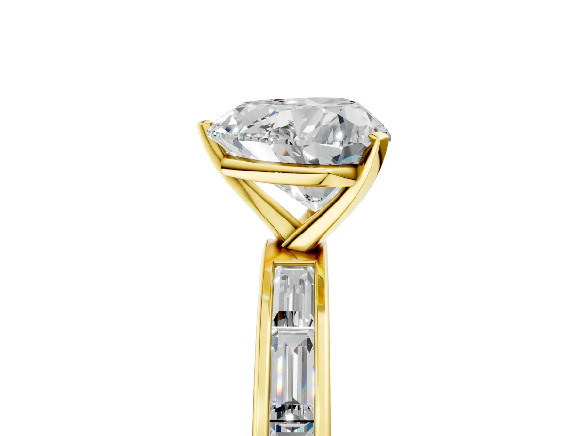 Heart Cut Solitaire Diamond Ring with Channel-Set Baguette Band and Four-Prong Setting Yellow gold