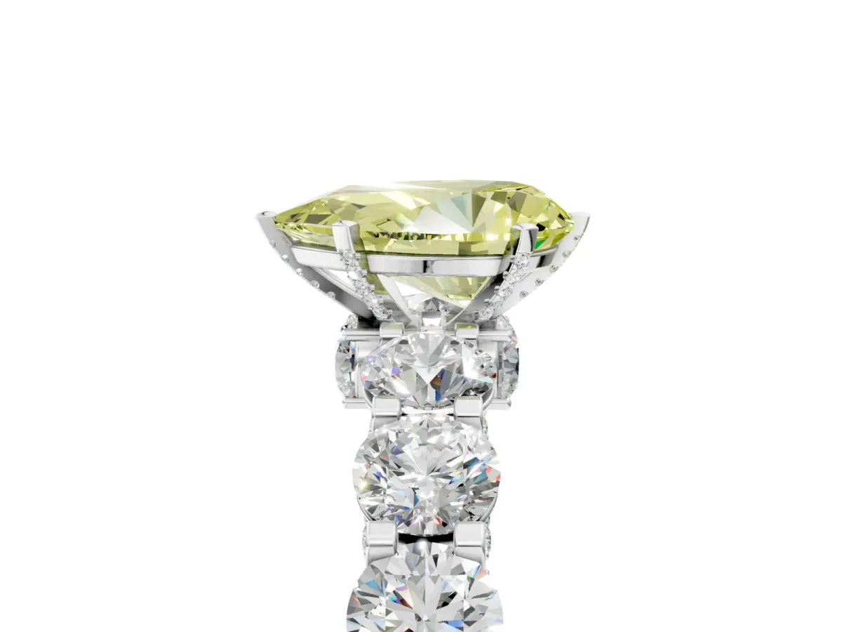 Fancy Yellow Pear Cut Diamond Side Stone Engagement Ring with Four-Prong Setting Platinum