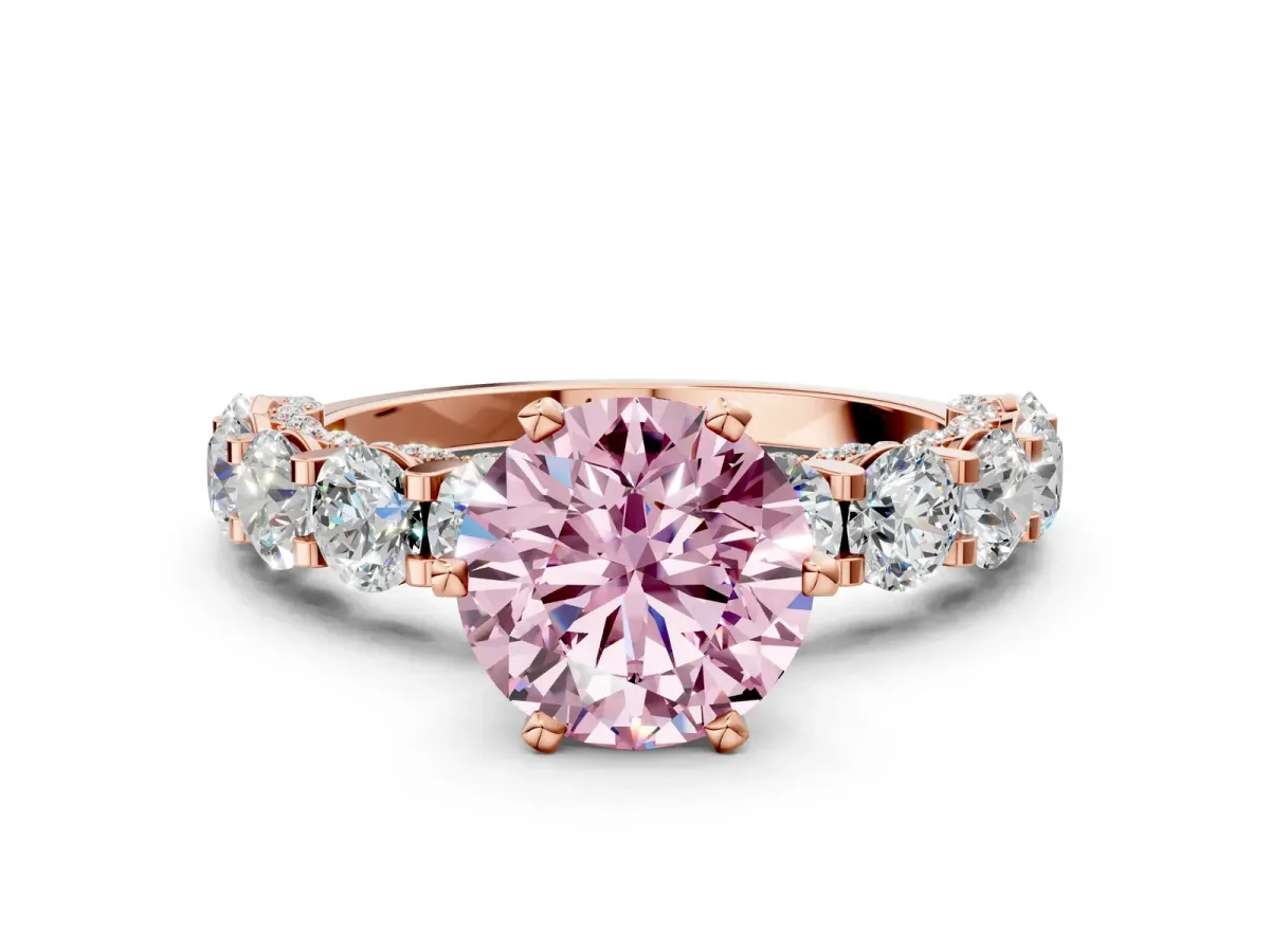 Fancy Pink Round Cut Diamond Side Stone Engagement Ring with Four-Prong Setting Rose gold