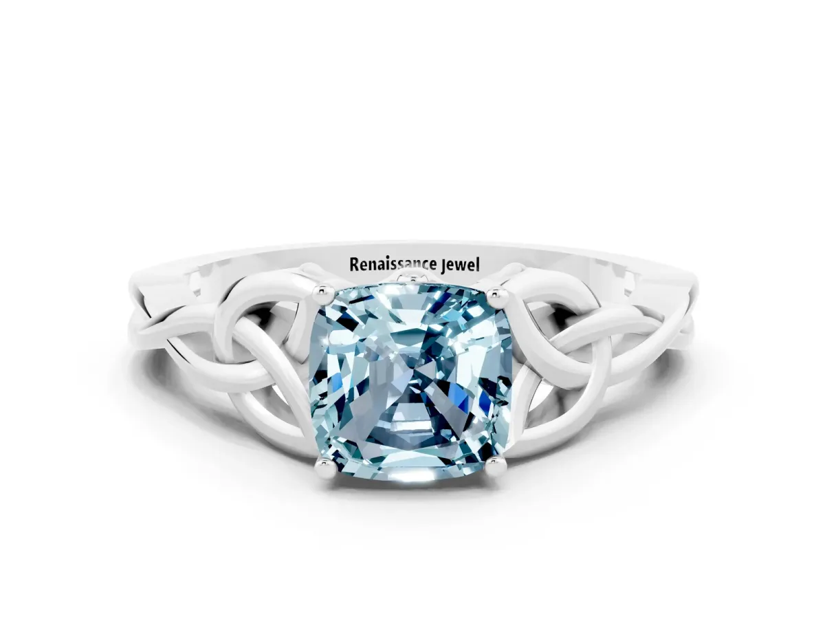 Cushion Cut Aquamarine Solitaire Engagement Ring with Celtic Knot Band and Four-Prong Setting White gold