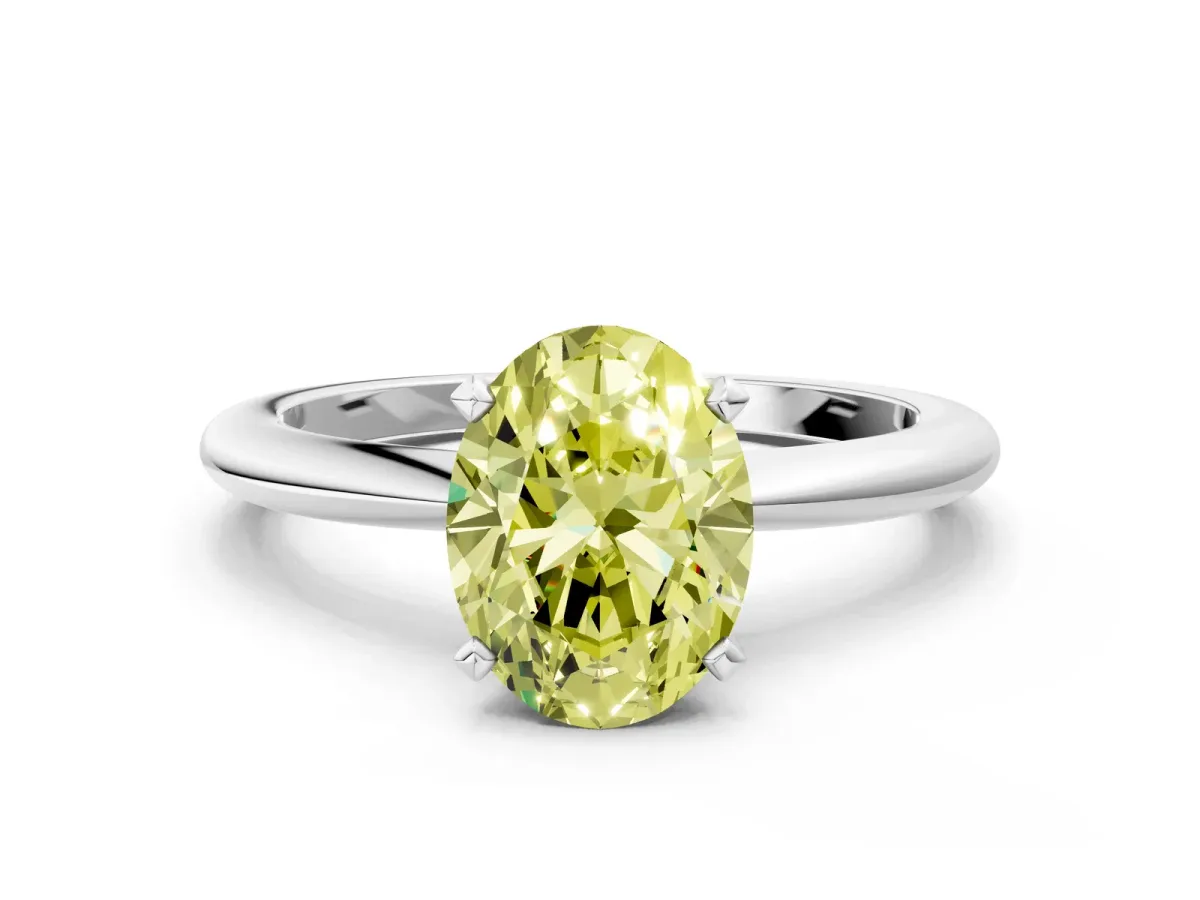 Fancy Yellow Oval Cut Diamond Solitaire Ring with Six-Prong Setting and Classic Band Silver