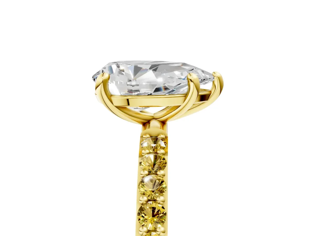 Pear Cut Diamond Solitaire Ring with Round Yellow Sapphire Pavé Band and Prong Setting Yellow gold