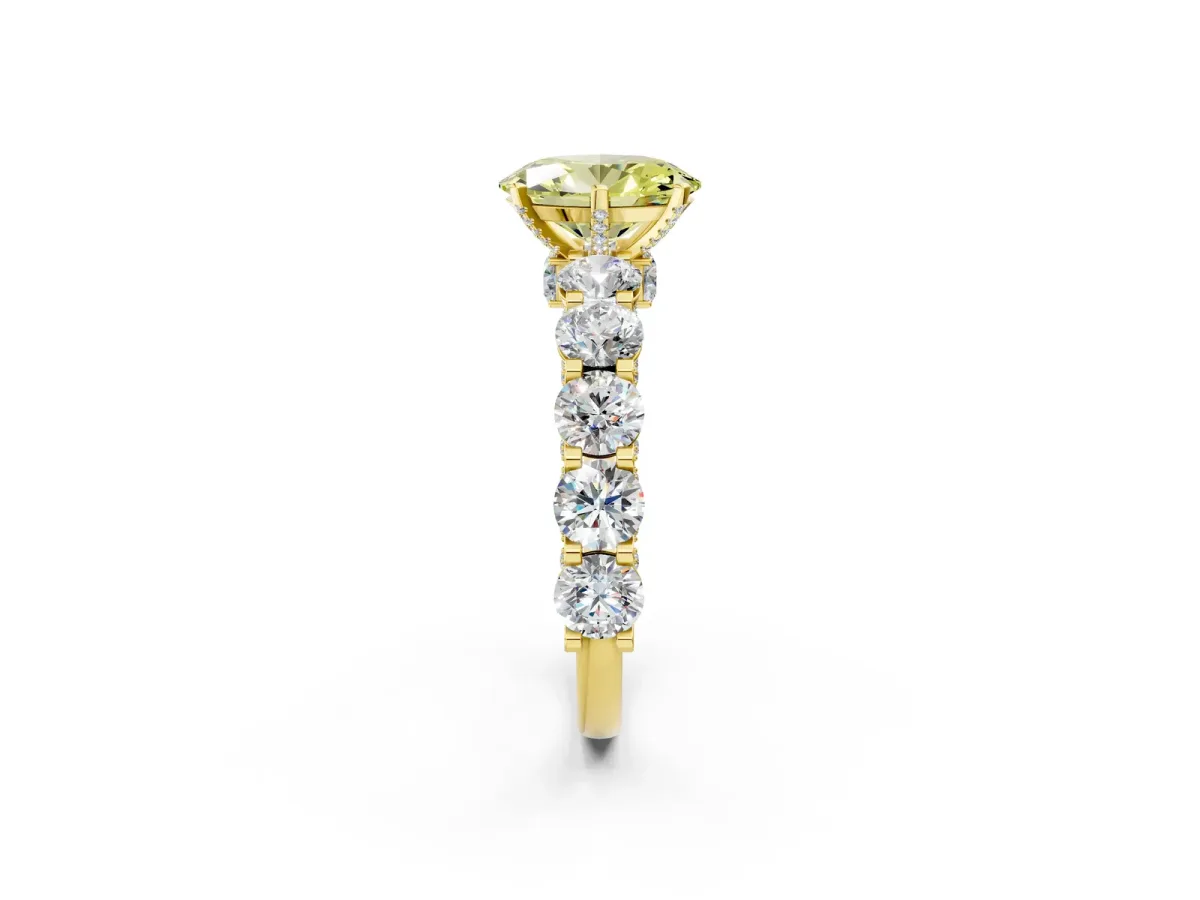 Fancy Yellow Oval Cut Diamond Side Stone Engagement Ring with Four-Prong Setting Yellow gold