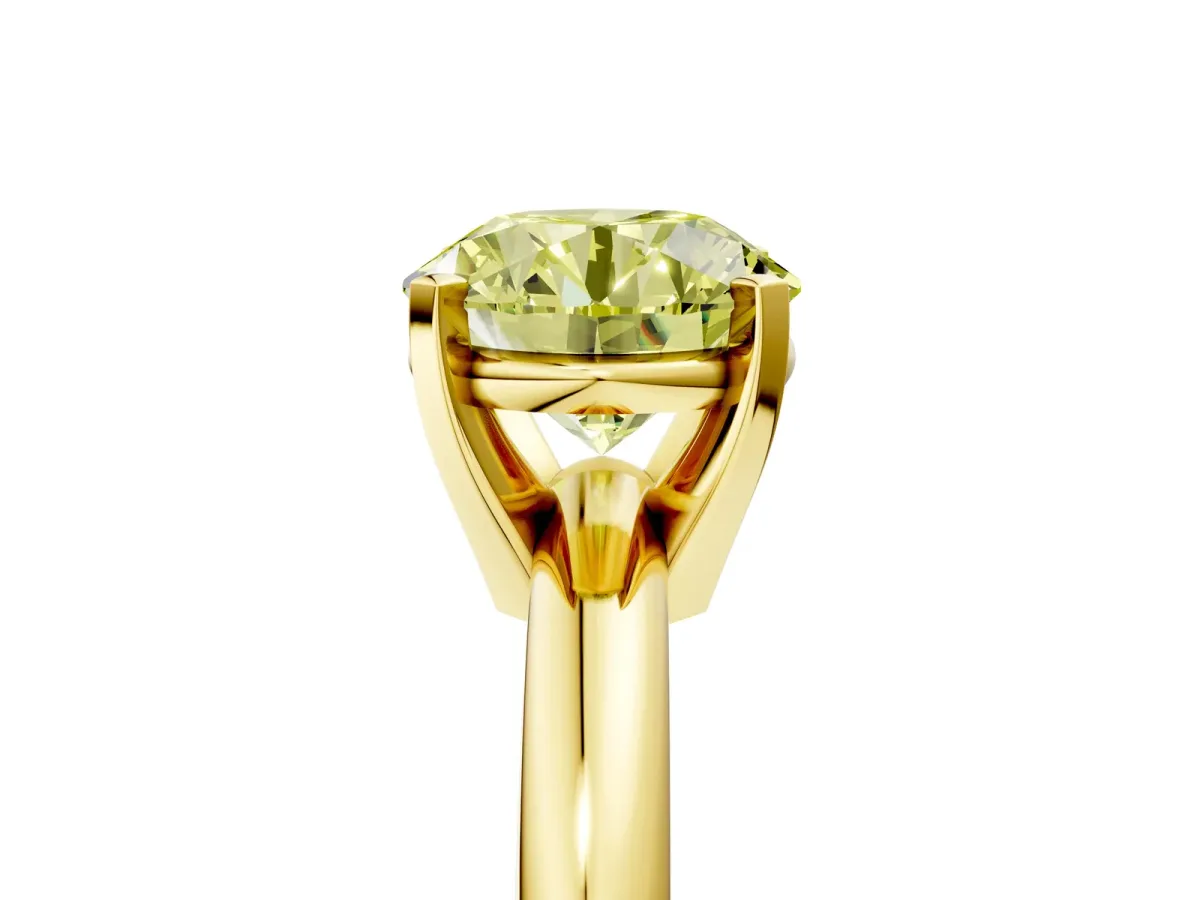 Fancy Yellow Round Cut Diamond Solitaire Engagement Ring with Round Band and Four-Prong Setting Yellow gold