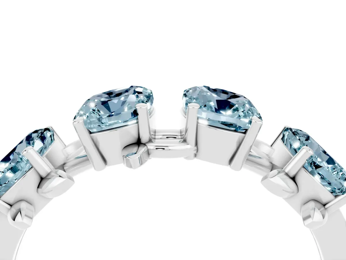 Four-Stone Elongated Cushion Aquamarine Band with Nature-Inspired Prong Setting Platinum
