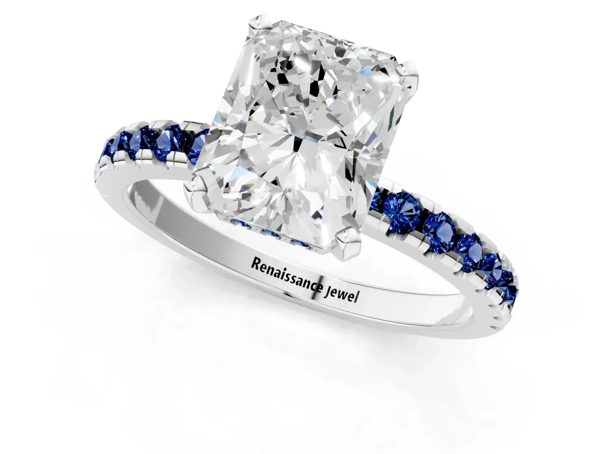 Radiant Cut Diamond Solitaire Ring with Round Blue Sapphire Pavé Band and Four-Prong Setting White gold