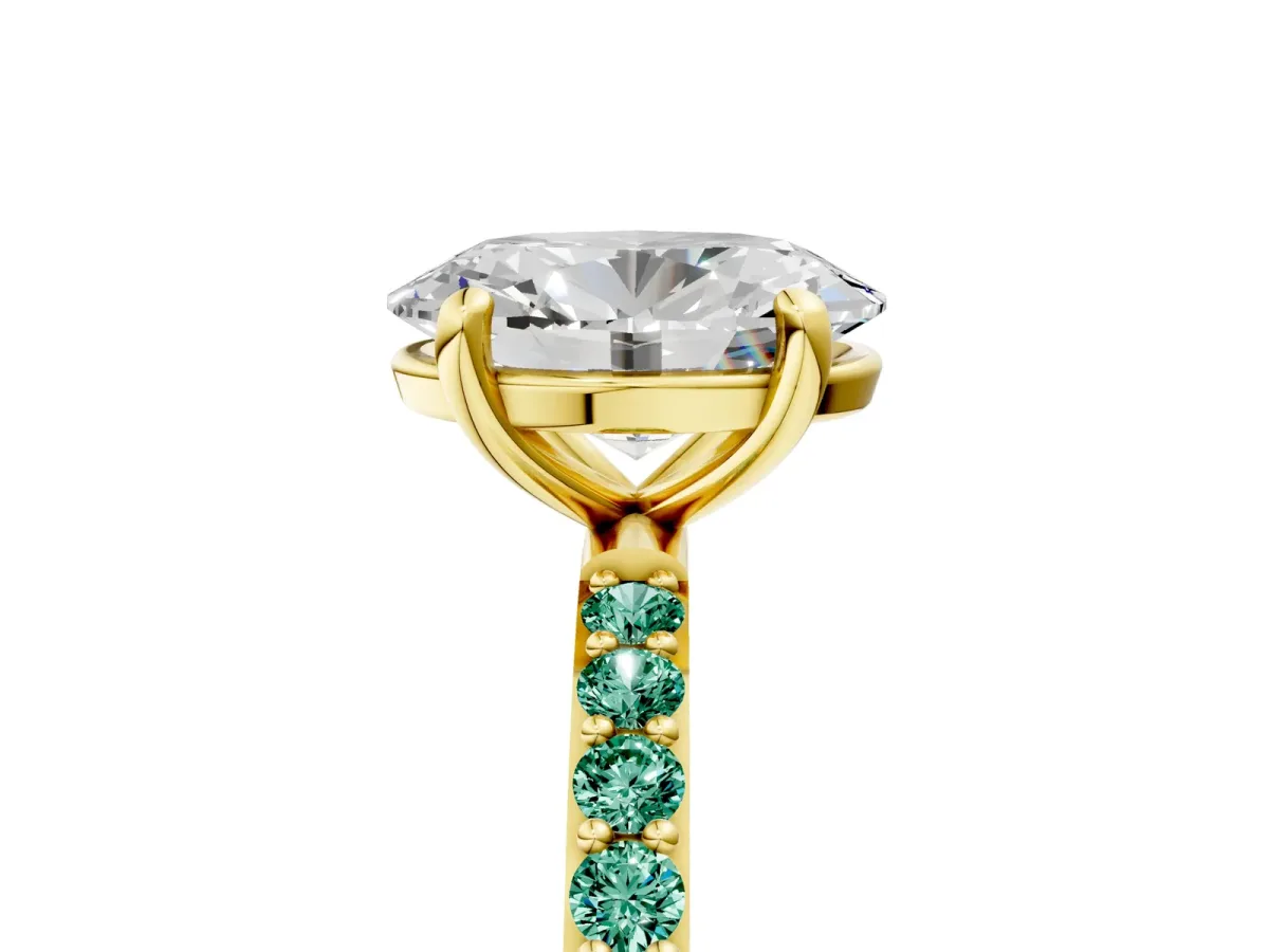 Oval Cut Diamond Solitaire Ring with Round Green Sapphire Pavé Band and Prong Setting Yellow gold