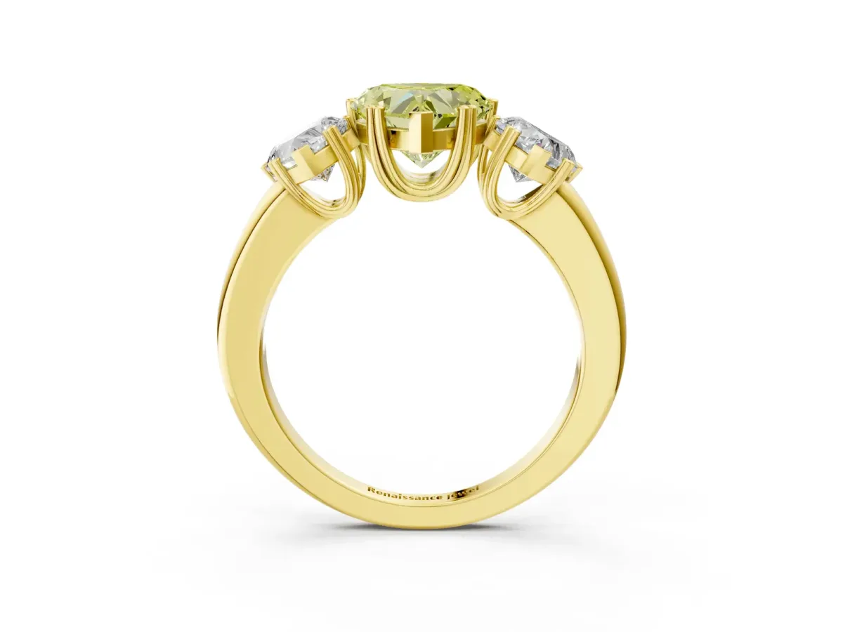 Fancy Yellow Three-Stone Heart Cut Cut Diamond Ring with Channel Set Band and Four-Prong Setting Yellow gold