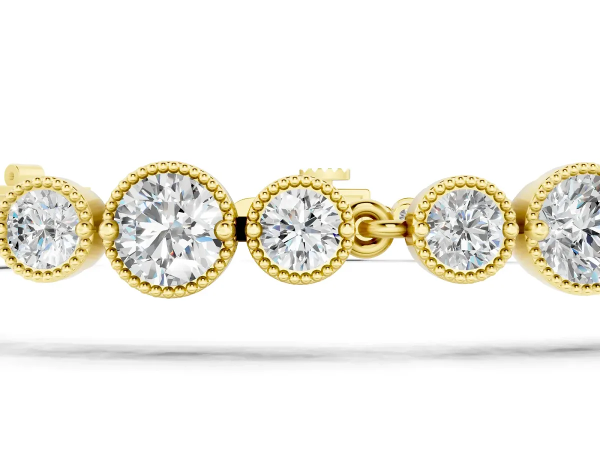 Round Bezel-Set Diamond Tennis Bracelet with Milgrain Detailing Yellow gold