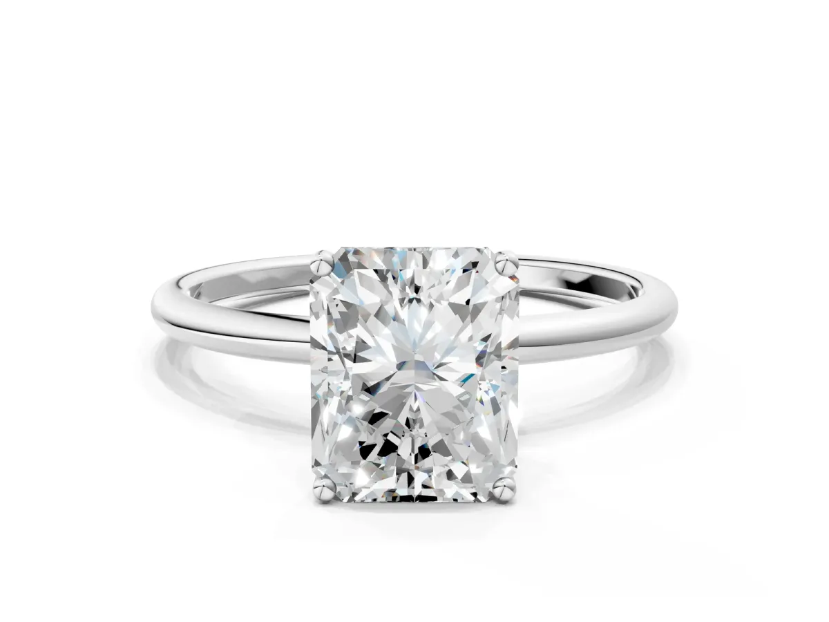 Radiant Cut Cut Solitaire Engagement Ring with Thin Band and Four-Prong Setting Platinum