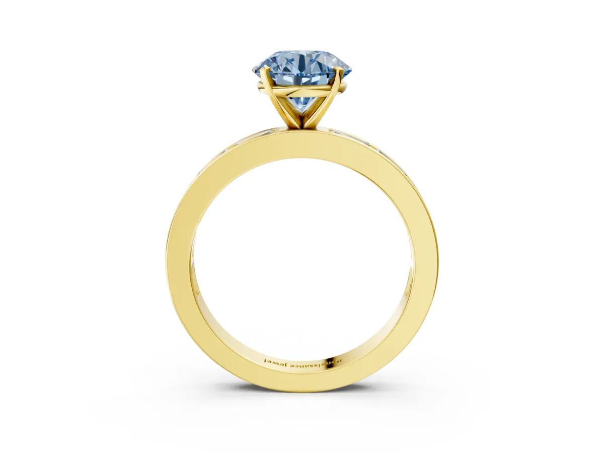 Fancy Blue Round Cut Solitaire Diamond Ring with Channel-Set Baguette Band and Four-Prong Setting Yellow gold