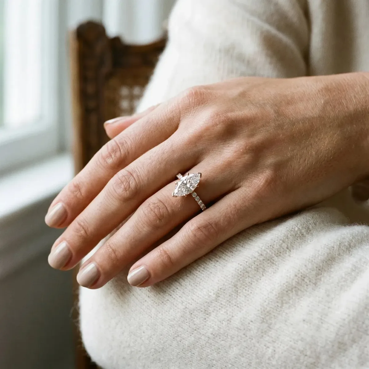 Marquise Cut Moissanite Solitaire Ring with Round Pavé Band and Four-Prong Setting Rose gold