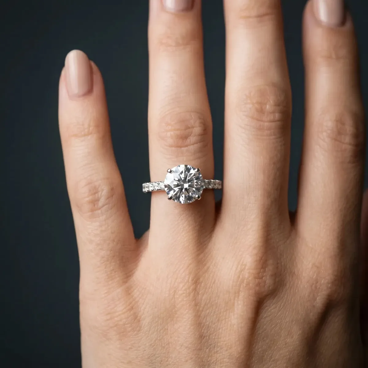 Round Cut Diamond Solitaire Pavé Band with Four-Prong Setting Silver