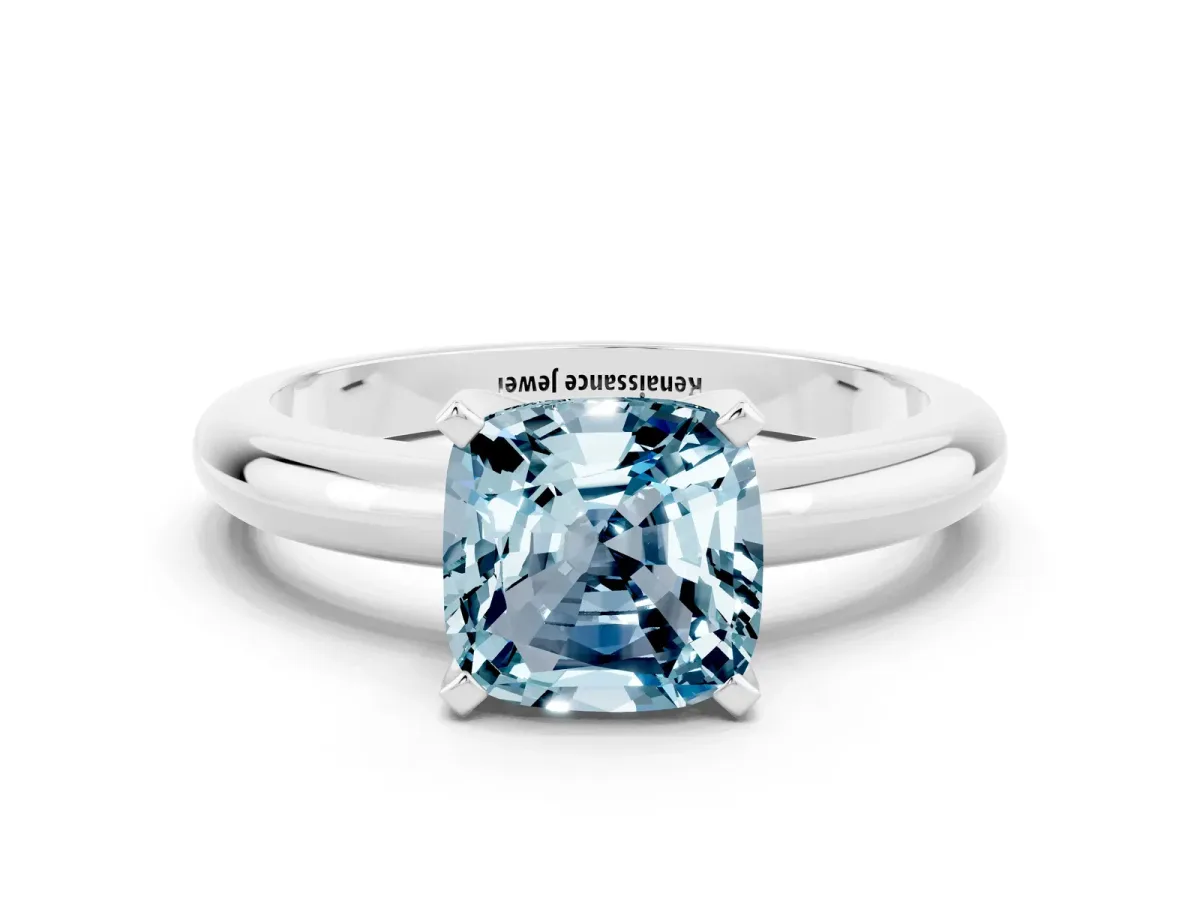 Cushion Cut Aquamarine Solitaire Engagement Ring with Round Band and Four-Prong Setting White gold