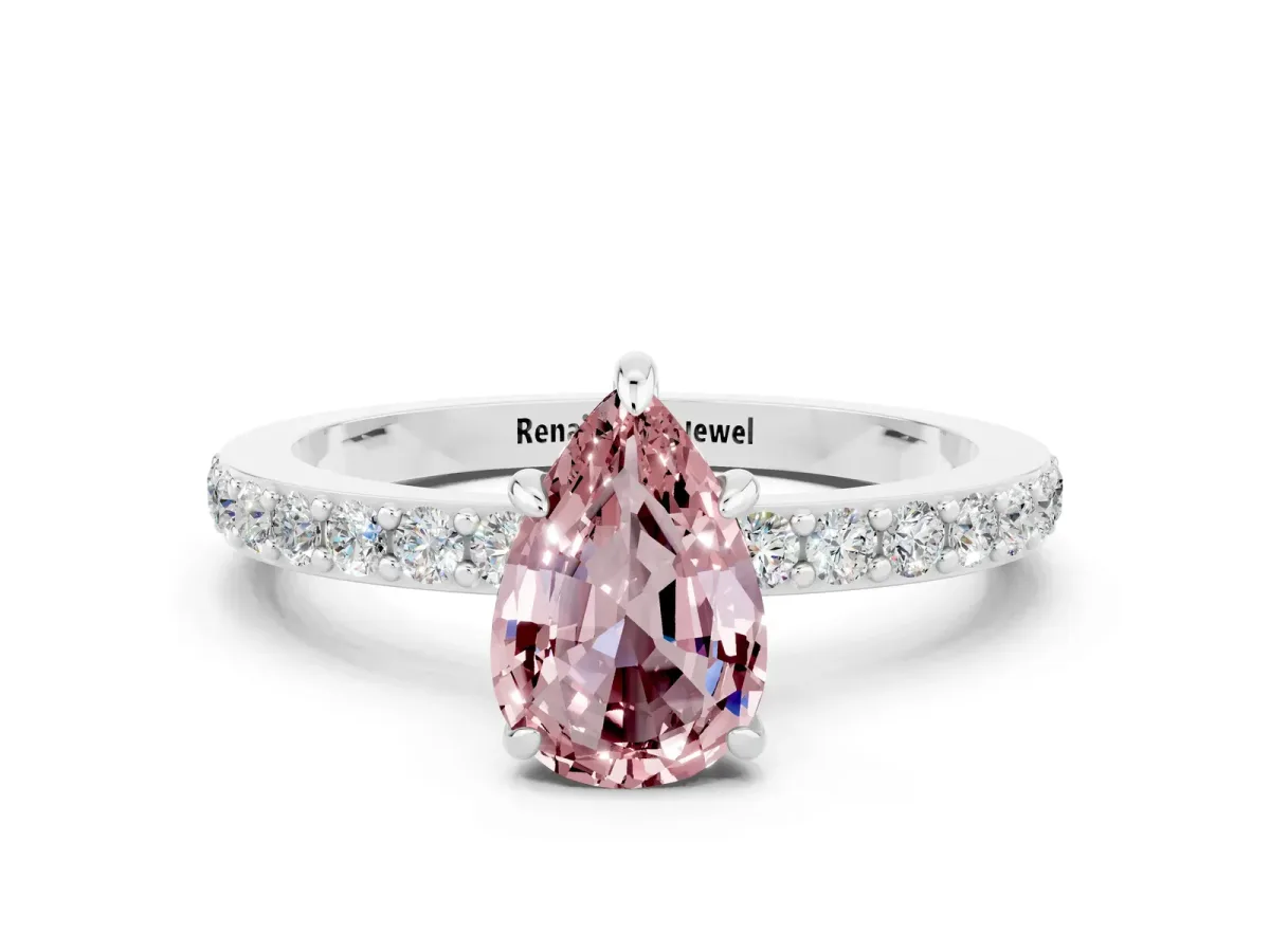 Pear Cut Morganite Solitaire Engagement Ring with Pavé Band and Four-Prong Setting Silver