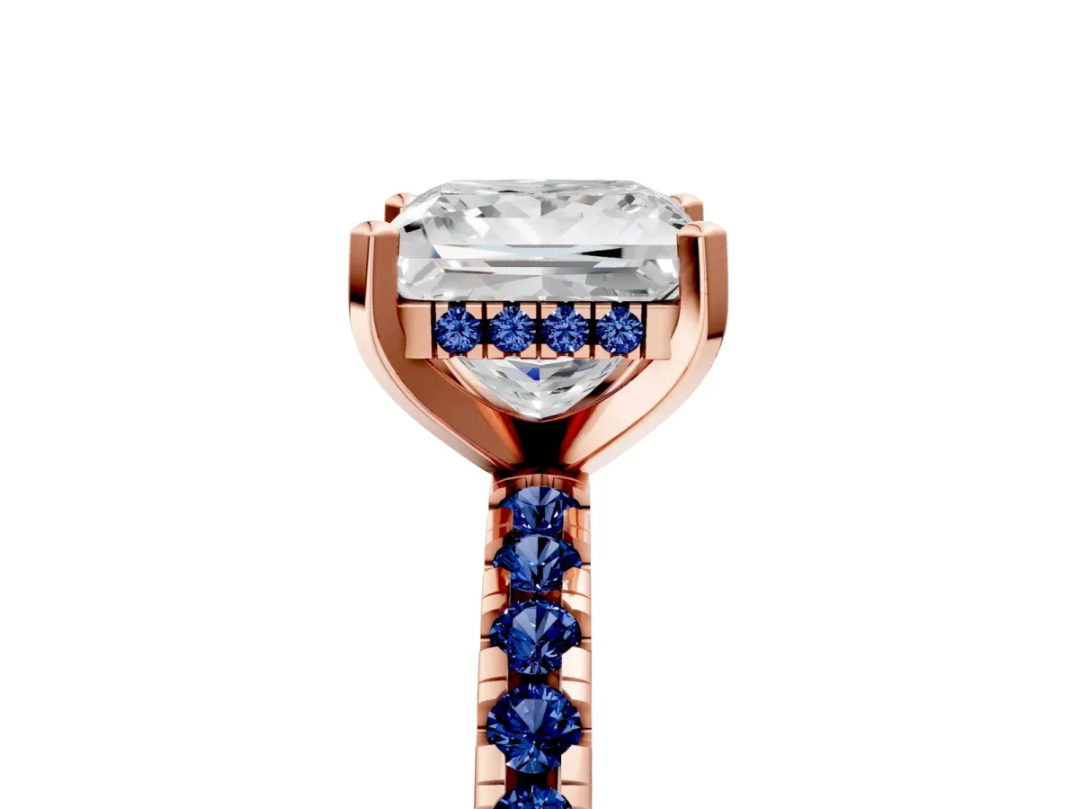 Princess Cut Diamond Solitaire Ring with Round Blue Sapphire Pavé Band and Four-Prong Setting Rose gold