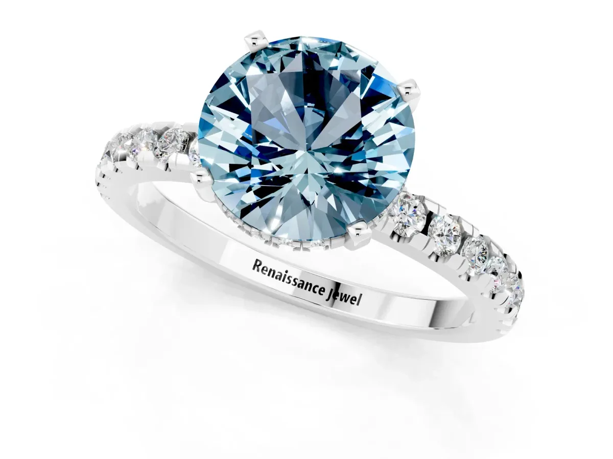 Round Cut Aquamarine Solitaire Ring with Round Pavé Band and Four-Prong Setting White gold