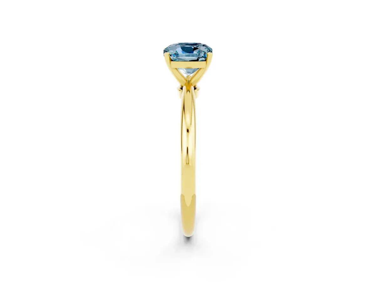 Cushion Cut Aquamarine Solitaire Ring with Six-Prong Setting and Classic Band Yellow gold
