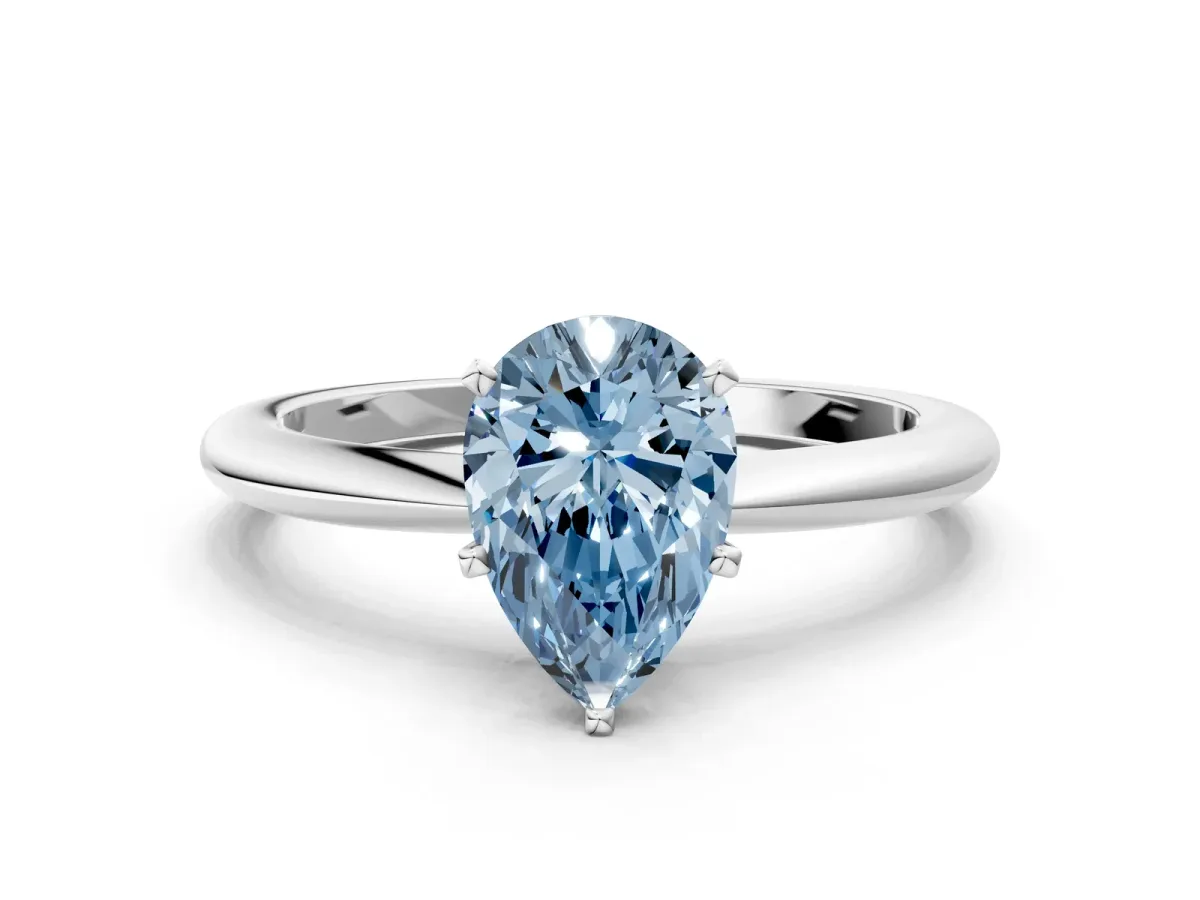 Fancy Blue Pear Cut Diamond Solitaire Ring with Six-Prong Setting and Classic Band Platinum