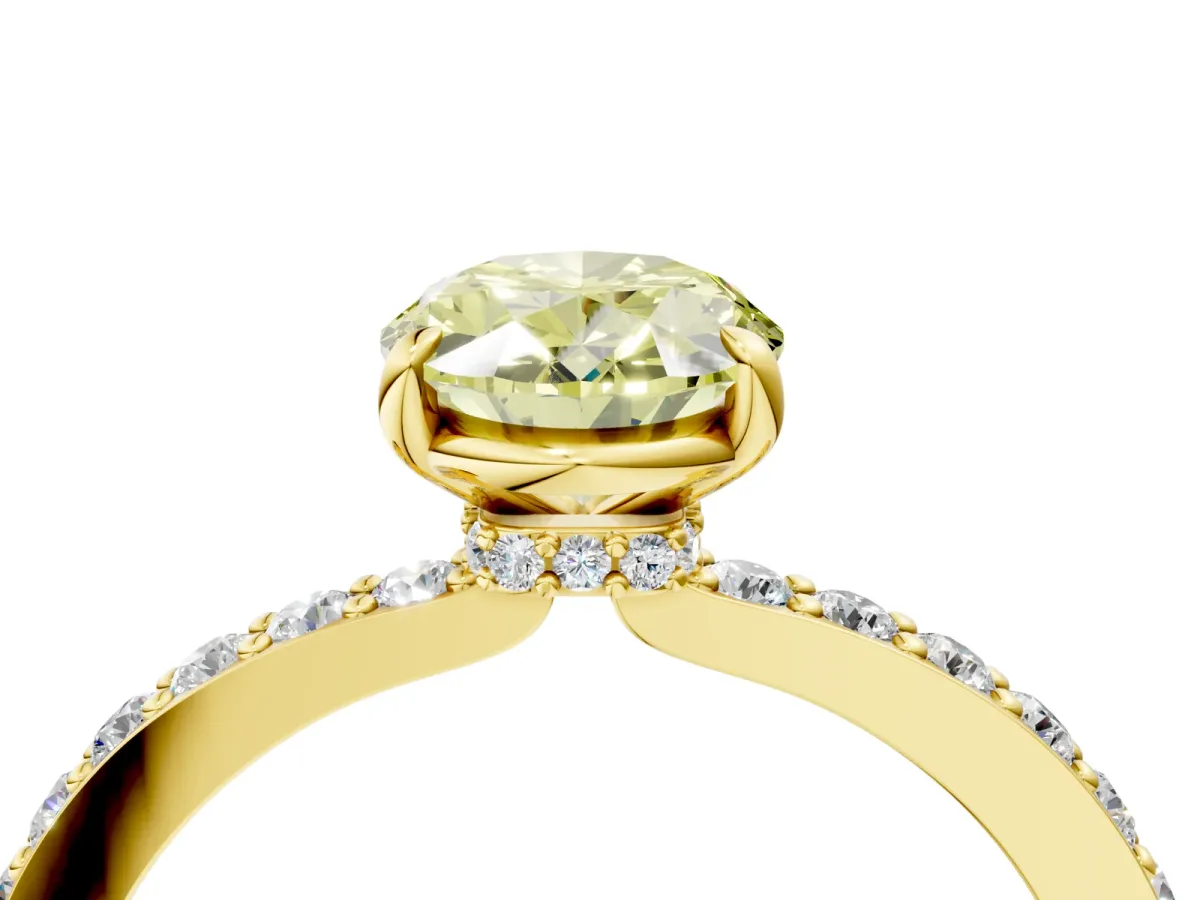 Fancy Yellow Oval Cut Diamond Solitaire Engagement Ring with Pavé Band and Four-Prong Setting Yellow gold
