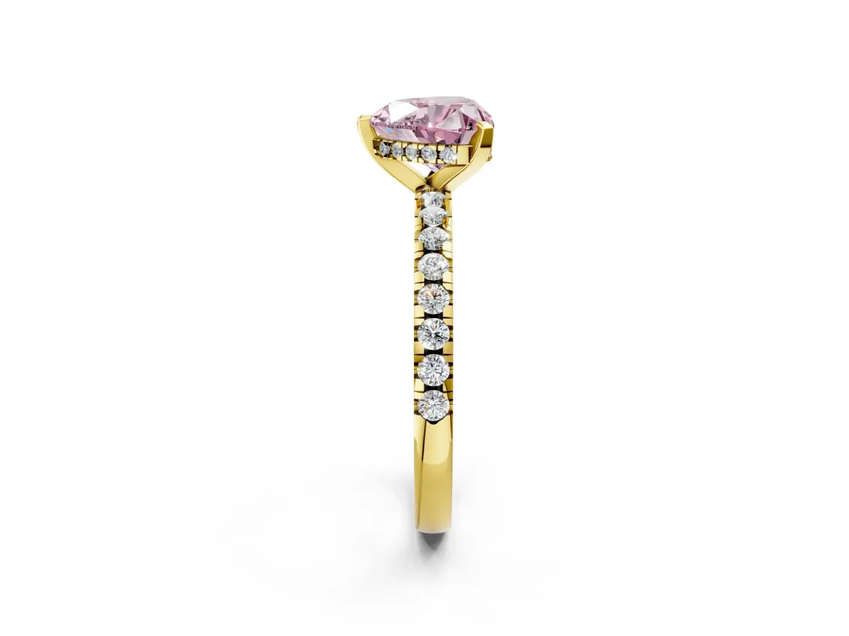 Fancy Pink Heart Cut Diamond Solitaire Ring with Round Pavé Band and Four-Prong Setting Yellow gold
